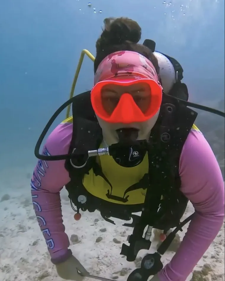 Mariya over the sand with her camera rig